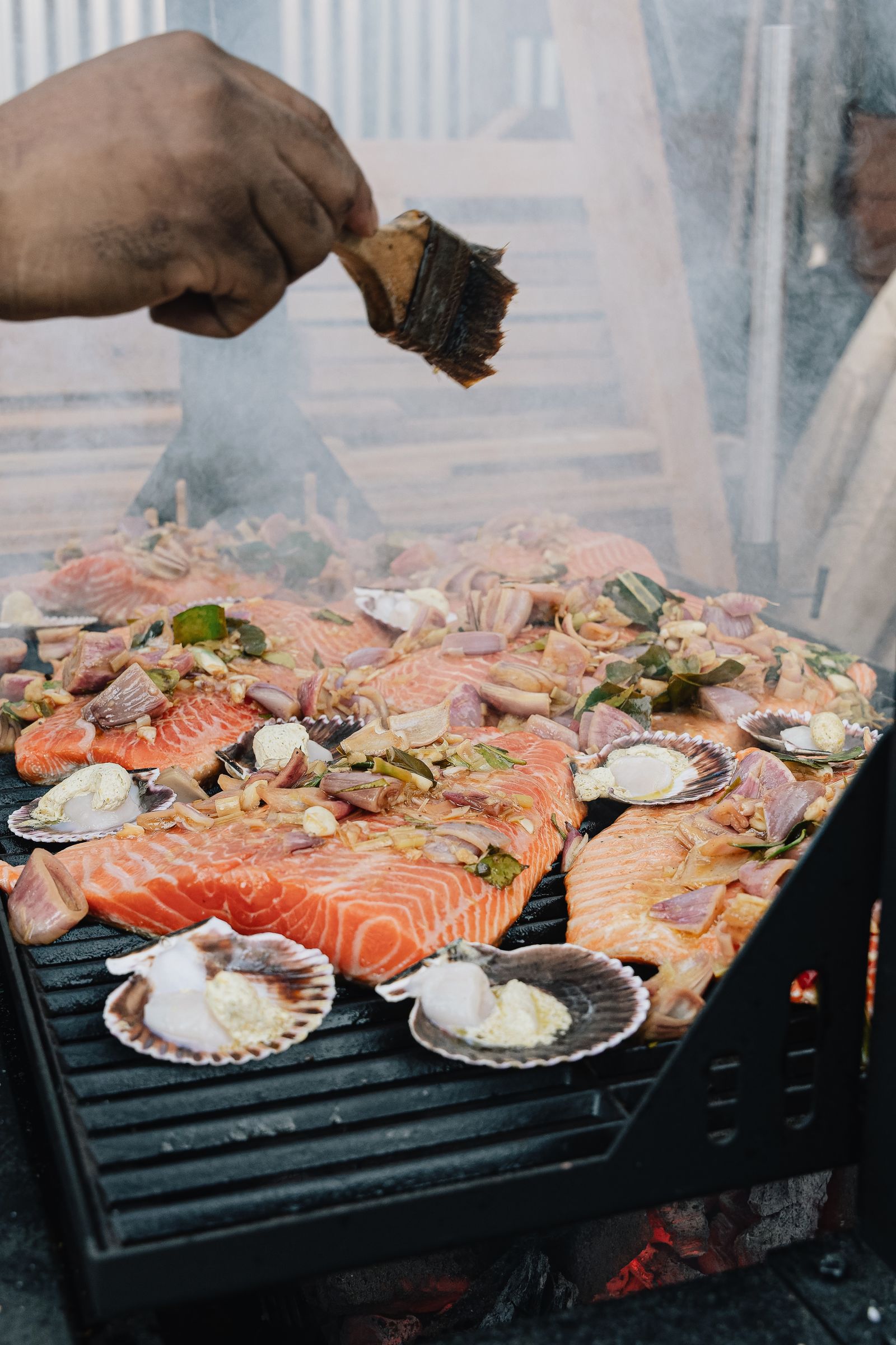 Guests, fire and the long table at the Rosalynn Summer Series dinner on 8 August 2026