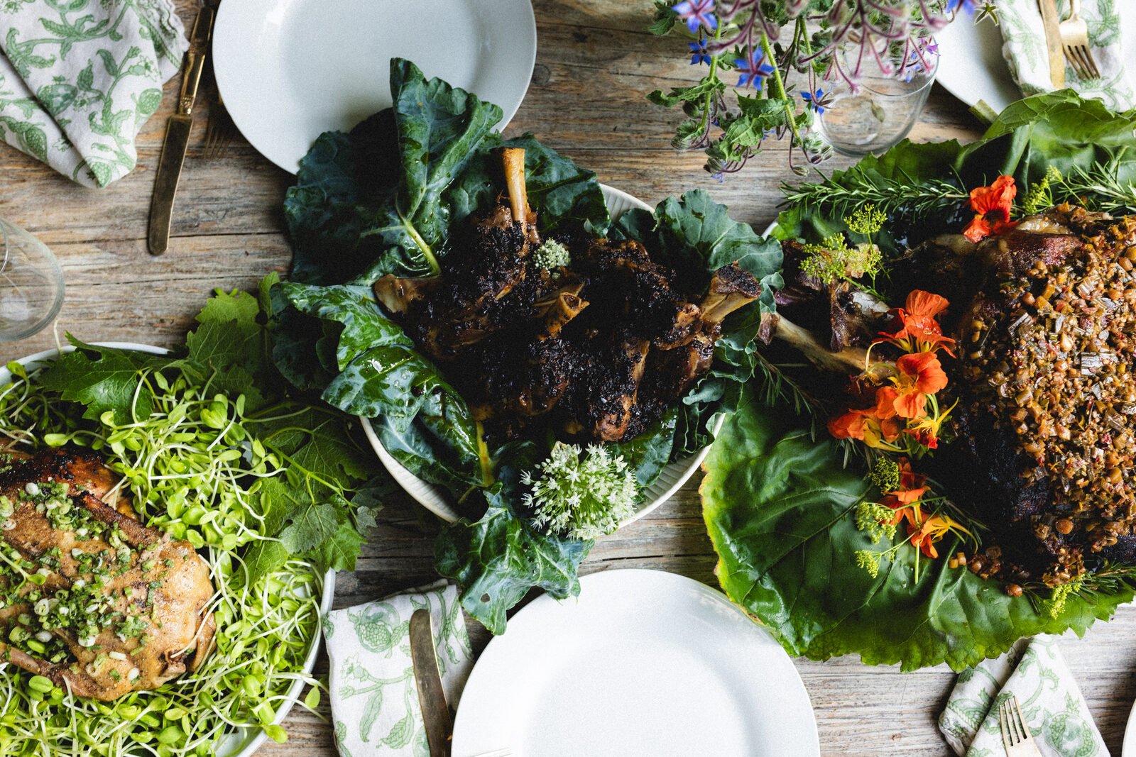 Lamb over greens, family style