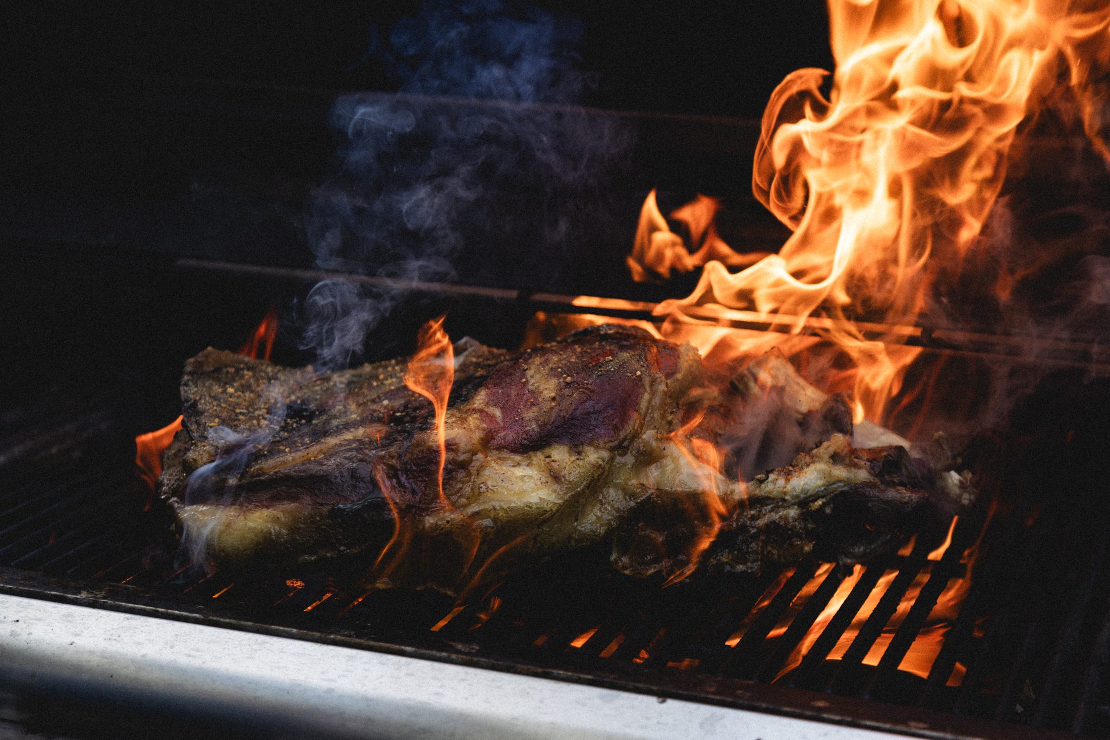 Live-fire cooking at a Rosalynn farm dinner