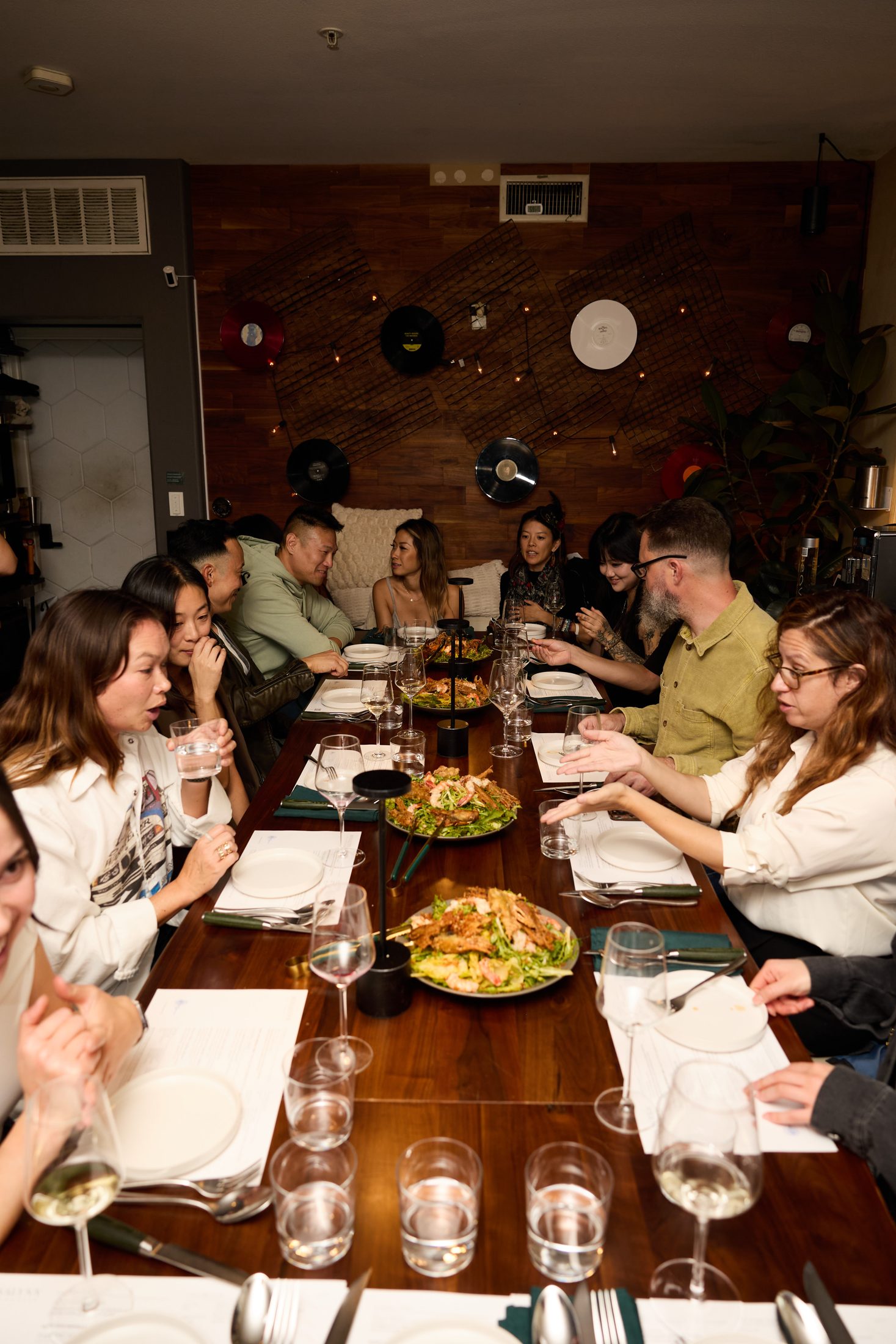 The table mid-dinner — supper club energy